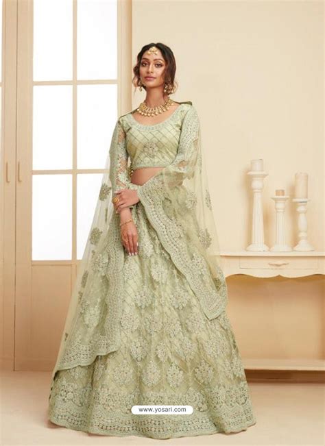 Buy Pista Green Heavy Embroidered Designer Net Wedding Lehenga Choli