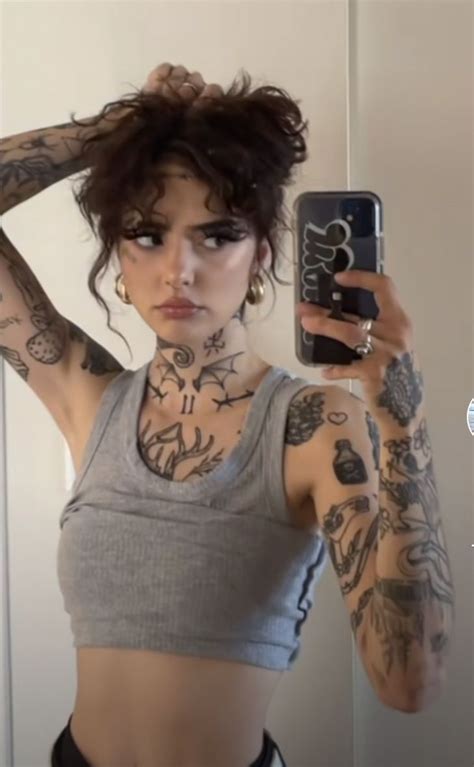 Tattooed Woman With Brown Hair
