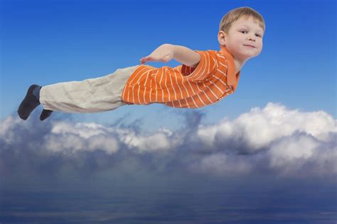 Young Boy Flying With Cloud Sky In Background Victoria Carlton The