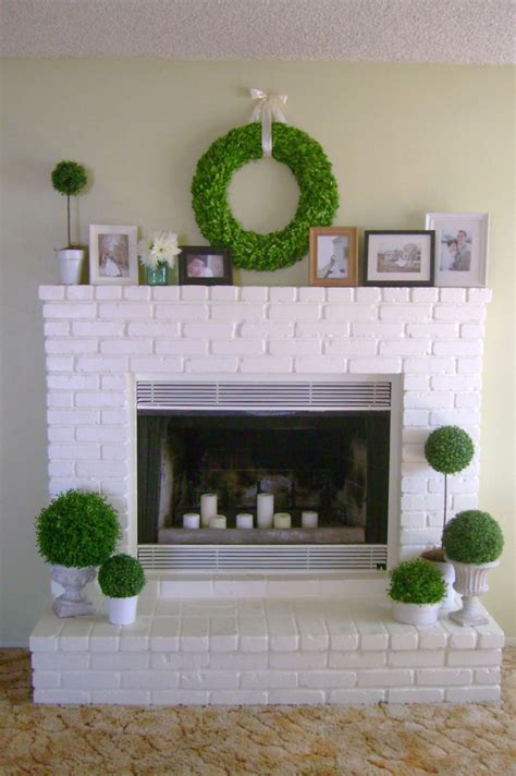 Hanging a large mirror above your fireplace is a classic way to decorate your mantel. 19 Sleek Modern White Fireplace Designs