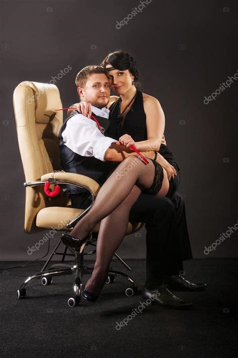 Girl Sitting On The Lap Of A Man Stock Photo Image By