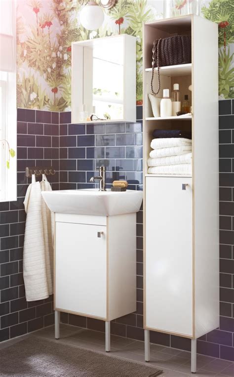 It comes with shelves to hold small bathroom basics, as well a rack to hang washcloths and hand towels. IKEA TYNGEN bathroom furniture pulls double duty to make ...
