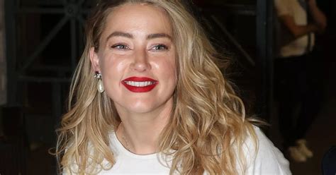 amber heard looks radiant as she beams at first film premiere since johnny depp trial mirror