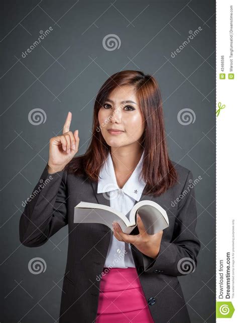 Asian Business Girl Hold A Book And Point Up Stock Photo Image Of