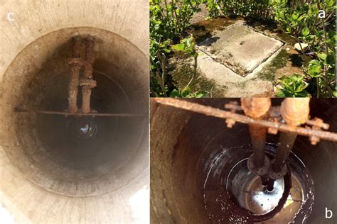 Strange Waterwell With Two Big Pipes Inside Going To The Bottom