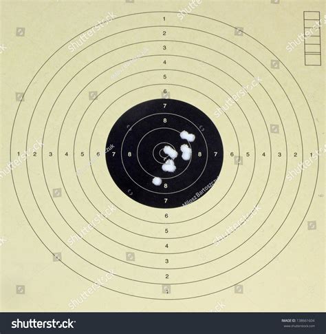 Target With Bullet Holes Stock Photo 138661604 Shutterstock