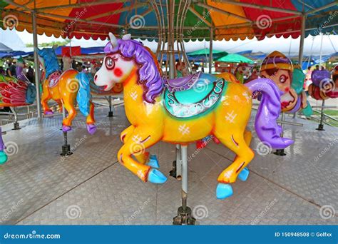 Horses On A Carnival Merry Go Round Old French Carousel In A Holiday