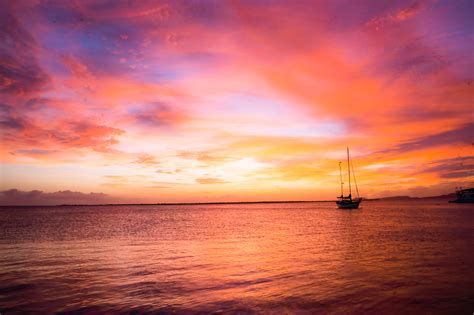 Red Sunset Over The Ocean | Bonaire, Dutch Caribbean | Coastlines, Ocean Caribbean | Photos, Prints