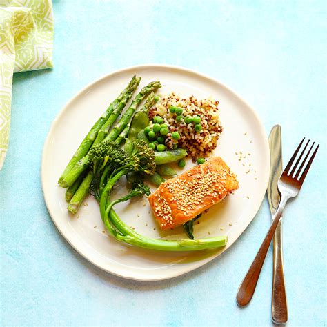 Salmon recipes are some of food network's most popular. quick and easy one tray oven baked salmon with quinoa and rice