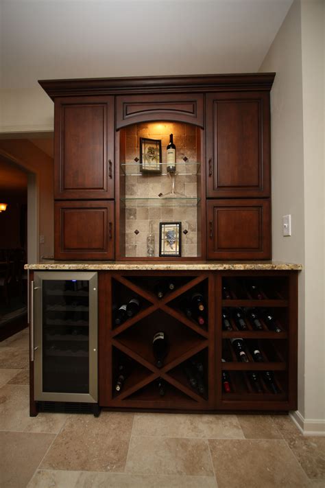 Home bar and wine cabinets. Beverage center with wine racking and wine cooler | Home ...