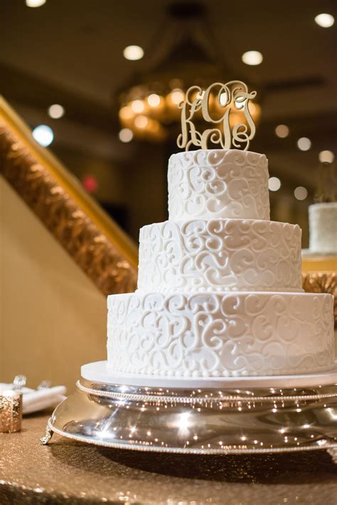 White Wedding Cake With Swirl Piping