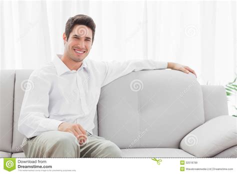 Stylish Young Man Sitting On Sofa Stock Image Image Of Portrait