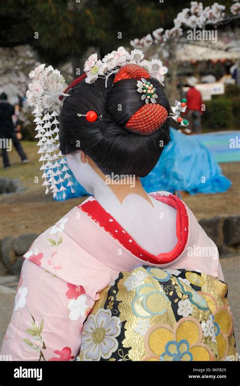 A Maiko A Trainee Geisha Showing Her Typically Erotically Painted