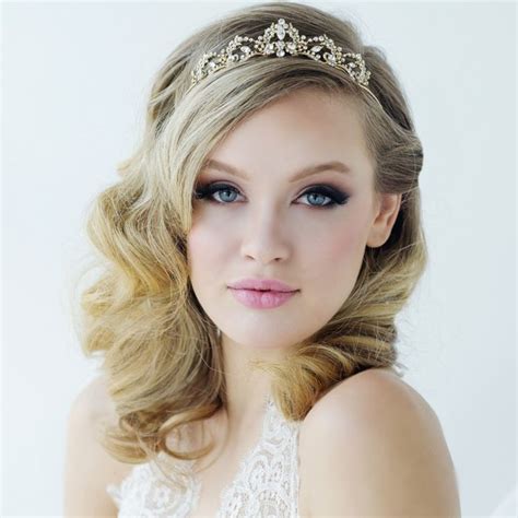 Neat edges and hair accessories take one of the classic wedding hairstyles for black women to the next level. Aye Do Weddings | Tiara hairstyles, Wedding tiara ...