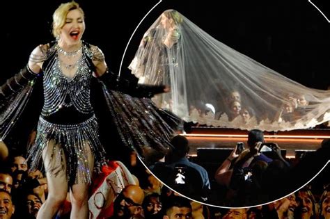 Madonna Shocks As She Pulls Down A Female Fan S Top To Reveal Her Bare Breast On Stage Mirror