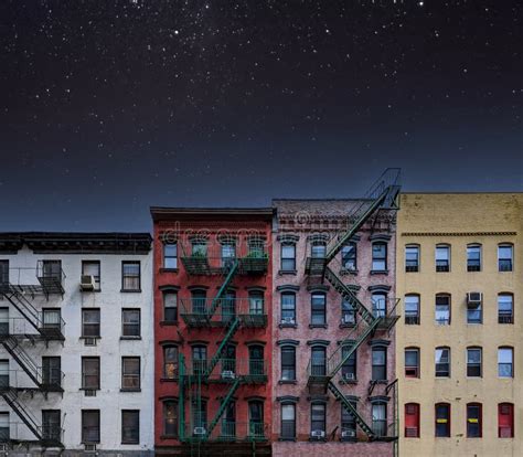 Old Colorful New York City Apartment Buildings With A Star Filled Night