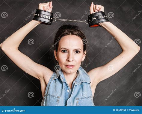 arrest and jail criminal woman prisoner girl in handcuffs royalty free stock image