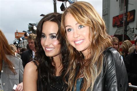 do miley cyrus and demi lovato have a romantic history thinking of something