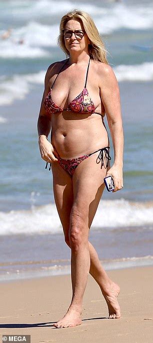 Penny Lancaster Showcases Her Incredible Figure In A Red Bikini During Holiday In Sydney