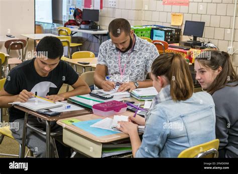High School Students Working Together In The Classroom Stock Photo Alamy