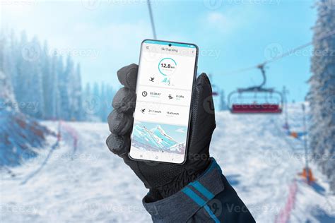 Ski Tracking App On Smartphone In Man Hand On Ski Lift Ski Slopes In