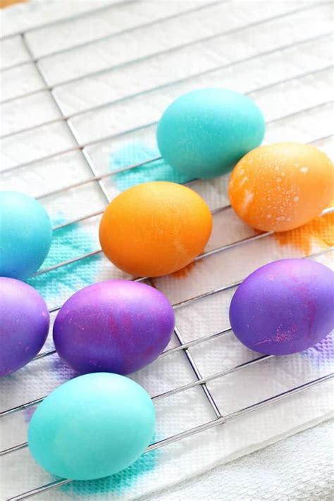 Squeeze a few drops of concentrated food coloring into each cavity, stirring with a spoon until. How To Dye Easter Eggs And Get Vibrant Colors - All Things ...