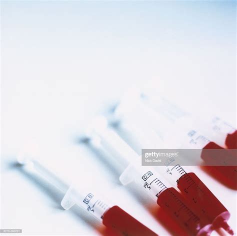 Blood Filled Syringes High Res Stock Photo Getty Images