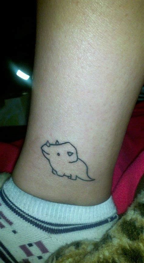 Discover thousands of free dinosaur tattoos & designs. See more Little Dinosaurs tattoos on ankle | Dinosaur tattoos, Nose tattoo, Elephant tattoos