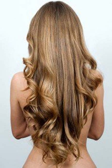 The hair has been parted to the sides, and the bob has been cut in a subtle round cut on the bottom. Hairstyles for v cut hair