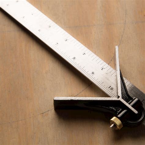 Just a simple try square instructions cut from 3mm or 4mm mdf. Tool Shop® 12"Combination Tri-Square at Menards®