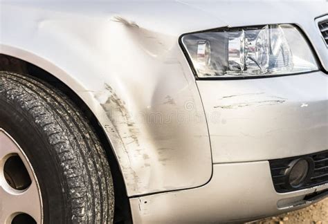 Car Damage After Crash Scratched And Dented Bumper Stock Image Image