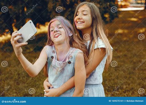 Two Cute Girls Have Fun In A Summer Park Stock Image Image Of Girls