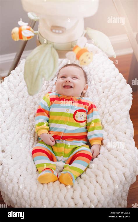 Cute Adorable Smiling Laughing White Caucasian Baby Boy Girl Lying In