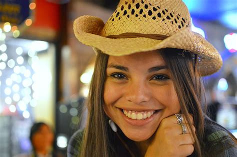 cowgirl with big smile brunette amateur cowgirl smile hat hd wallpaper peakpx
