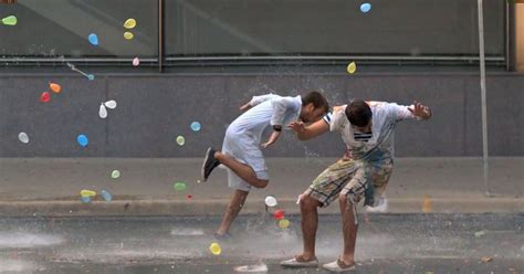 Watch The Most Epic Slow Motion Water Balloon Fight Ever Video