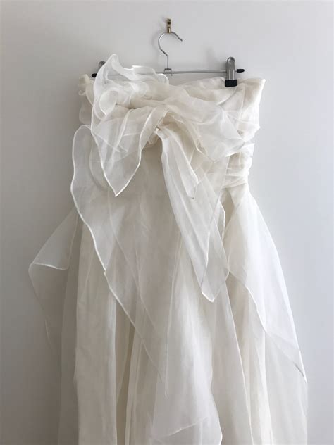 Check your inbox for trend updates and exclusive sales coming your way! Carla Zampatti Petal wedding dress Used Wedding Dress Save ...