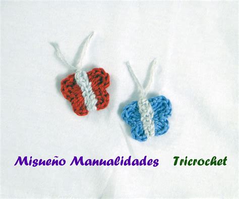 Modista es una empresa familiar con más de 90 años de tradición. Detalle de maripositas en ganchillo de una camiseta ...