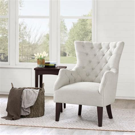 It is on the pricier side but if you. Hannah Off White Wing Chair