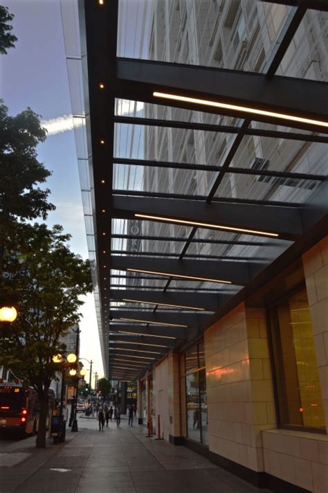 Masa architectural canopies has earned a reputation as the premier provider of awnings for storefronts on the east coast and around the country as whole. Storefront lighting for marquis retail establishment ...
