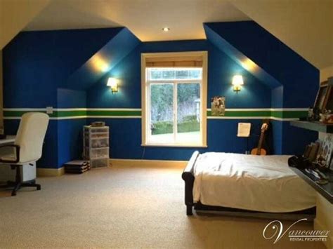 Stylin' christmas lights are a good dorm idea. Kids bedroom. Vancouver Canucks theme | hockey room ...