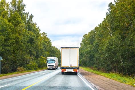 Freight Transport Rides Along A Forest Road Stock Image Image Of Lane