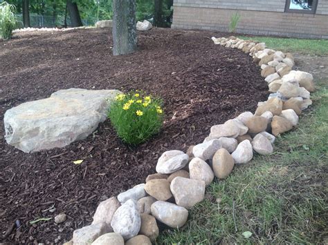 Large River Rock Makes An Incredible Border Landscaping With Rocks