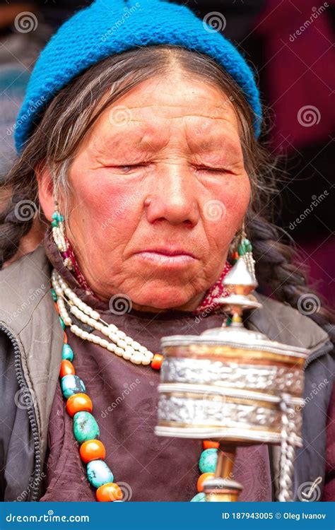 Older Ladakhi Women With Hand Prayer Wheels In Traditional Clothes On