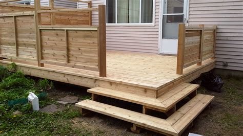 Western Red Cedar Deck With Corner Steps And Unique Privacy Railing