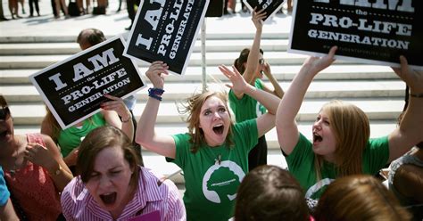 signs of protest outside the supreme court