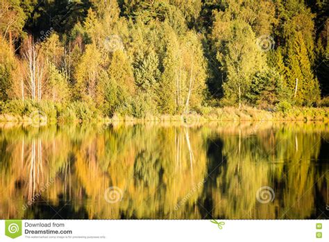 Beautiful Autumn Sunset At The Lake With Blue Sky Red And
