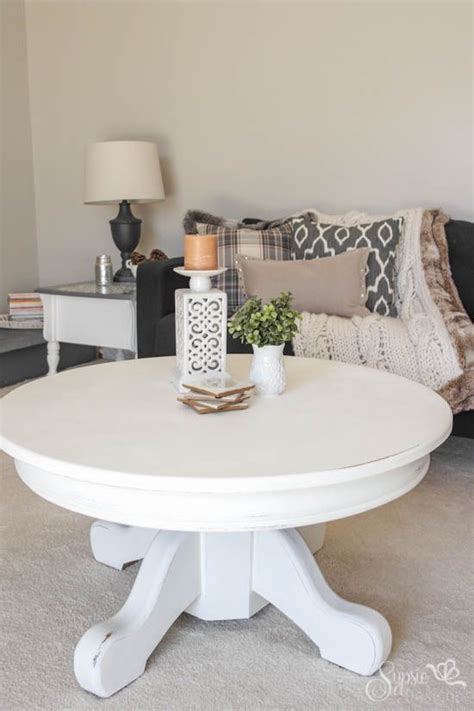 This contemporary mix of materials tops the round coffee table's frame with tempered glass, painted taupe on the underside for a. White Rustic Painted Coffee Table - Sypsie Designs ...