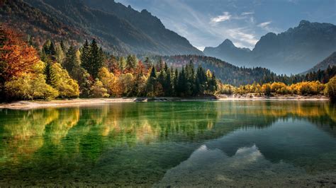 Calm Body Of Water Surrounded With Trees And Mountains During Daytime 4k Hd Nature Wallpapers