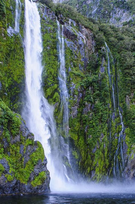 Huge Waterfall In Milford Sound Fiordland National Park Unesco World