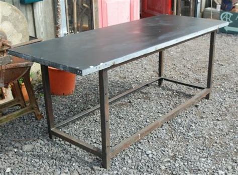 And the parasol hole in the center of the tabletop is designed for extra shade. M1306 RECLAIMED SLATE TOPPED GARDEN TABLE, PIZZA OVEN STATION
